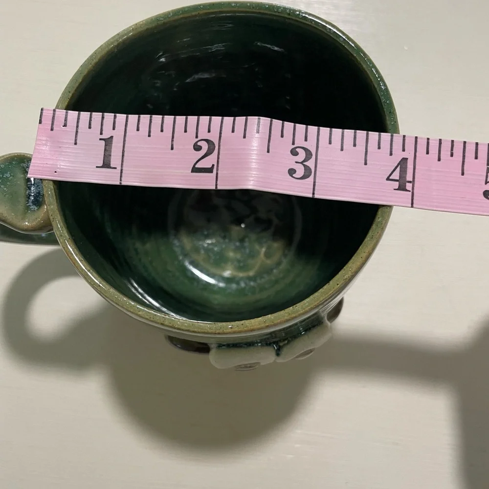 Good earth garden center‎ mug with crazy face